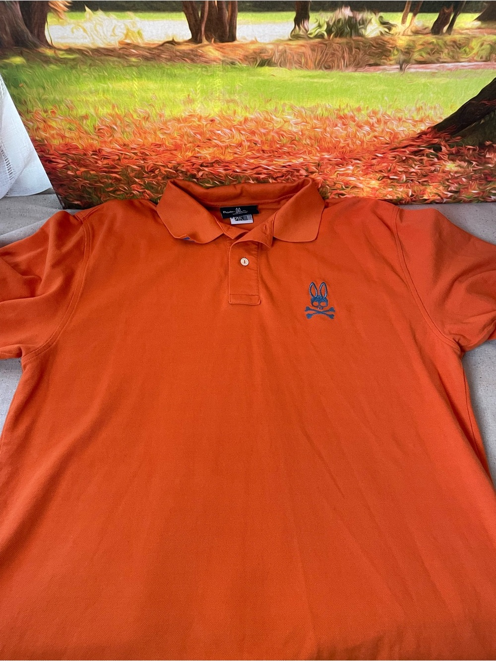 Psycho Bunny Orange Polo with Blue Bunny Logo